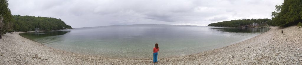 A cloudy day on vacation up in Door County, Charlie looking out on Pebble Beach in Sister Bay.